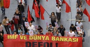 Police confront second day of anti-IMF protest in Istanbul